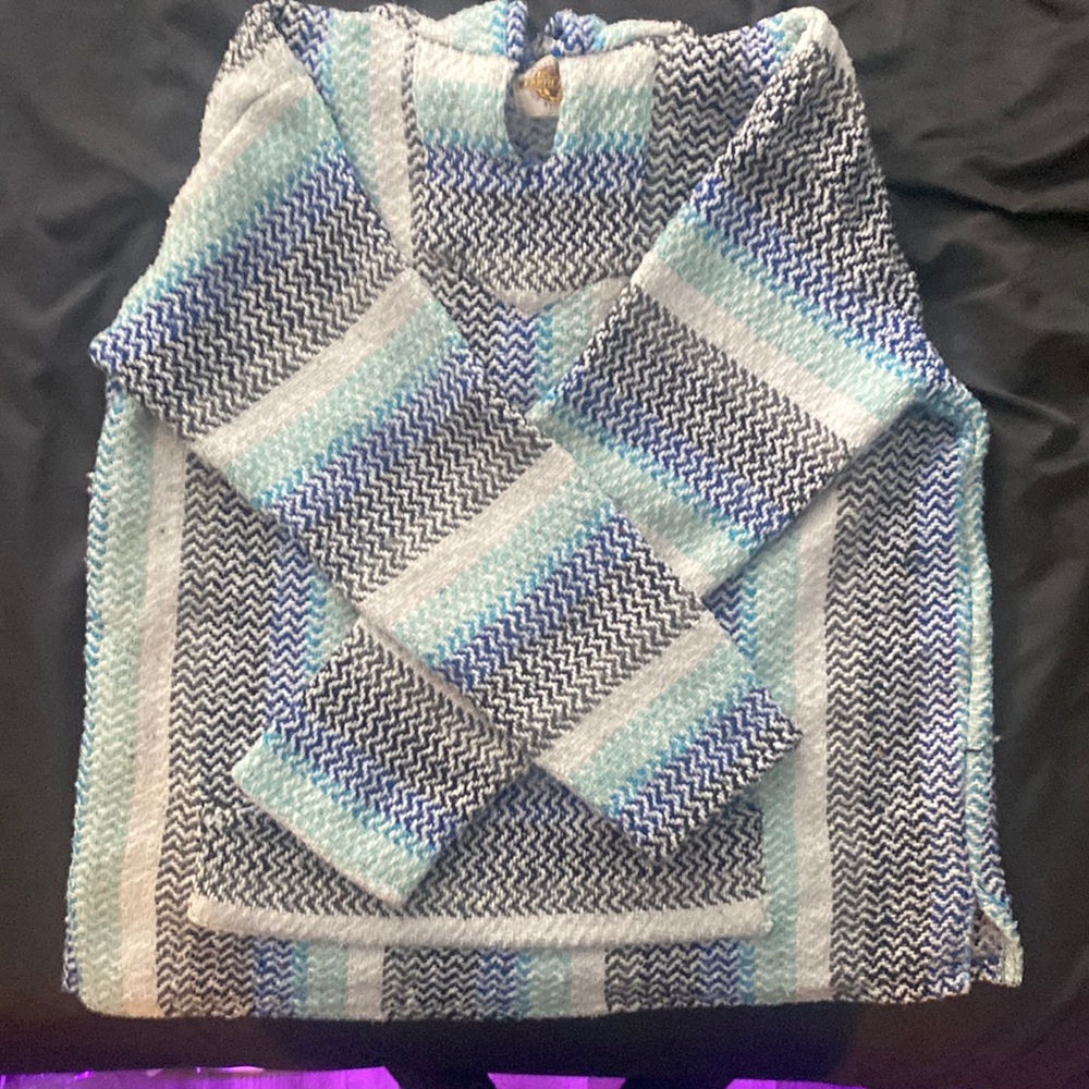 Blue, white, green and black drug rug. Barely worn.
